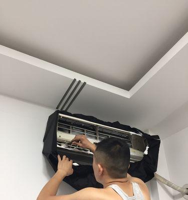 自己清洗空调挂机的方法（简单有效的空调清洗技巧）