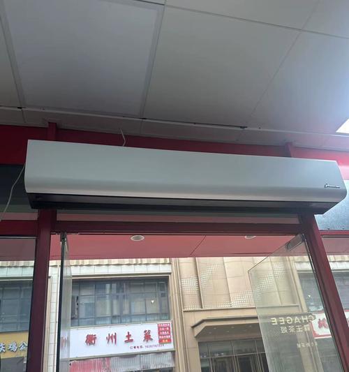 探究店铺风幕机冒烟的原因与解决方法（解析店铺风幕机冒烟现象）